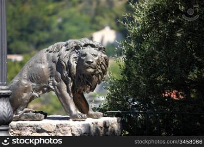lion statue in park park on background