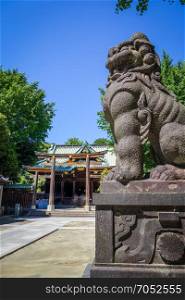 Lion statue in Ushijima Shrine temple in Sumida Park, Tokyo, Japan. Lion statue in Ushijima Shrine temple, Tokyo, Japan
