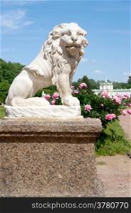 Lion statue of white marble in the park