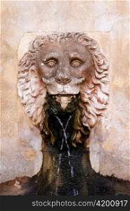 Lion stone sculpture fountain in Son Marroig at Deia Mallorca