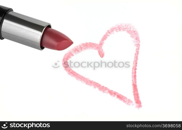 Lipstick and heart on paper