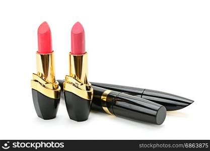 Lipstick and mascara isolated on white background