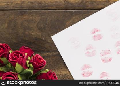 lipstick kisses paper near beautiful flowers