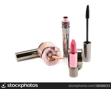 lipstick mascara and cream powder on a white background