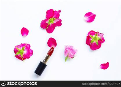 Lipstick with rose flower on over white background. Beautiful Make-up concept
