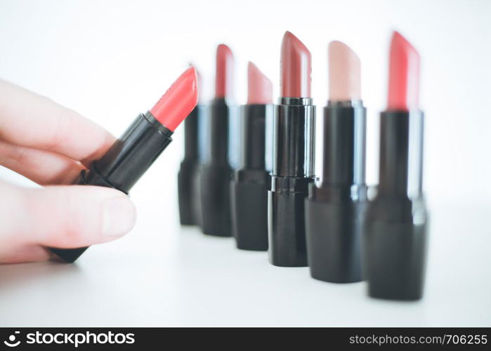 Lipsticks: Set of professional lipsticks, white background