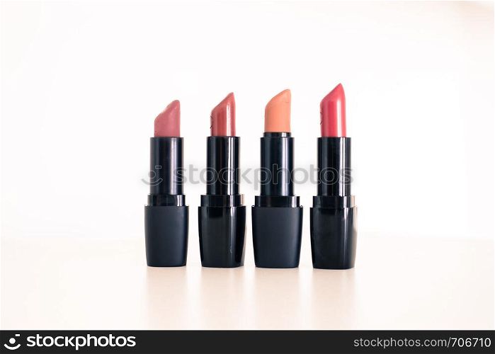 Lipsticks: Set of professional lipsticks, white background
