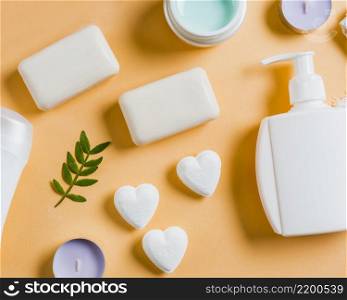 liquid soap dispenser pump soap cream colored backdrop