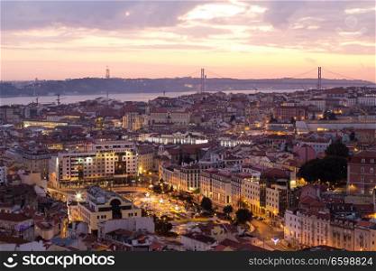 Lisbon cityscape panorama at sunset.. Lisbon cityscape panorama at sunset