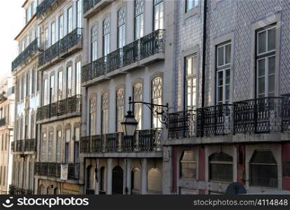 Lisbon exteriors with window balconies