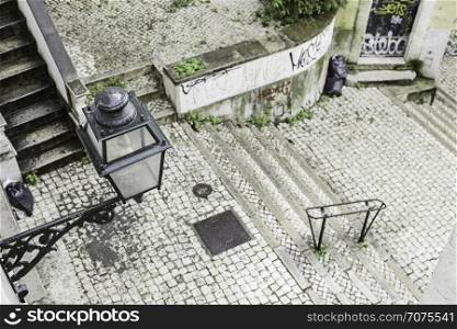 LISBON,PORTUGAL - APRIL 20, 2014: Stairs in Alfama district, old street in the city of Lisbon