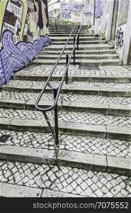 LISBON,PORTUGAL - APRIL 20, 2014: Stairs in Alfama district, old street in the city of Lisbon