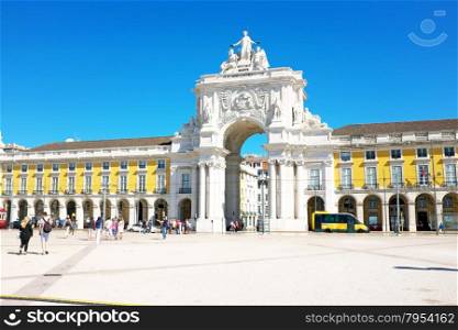 Lisbon, Portugal -May 30, 2015: Commerce square, one of the most important landmarks of the Portuguese capital, with the famous Triumphal Arch in Lisbon Portugal