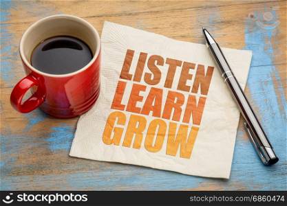 Listen, learn, grow - inspirational word abstract on a napkin with a cup of coffee