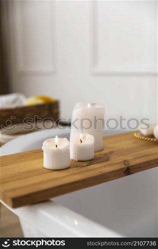 lit candles bathroom