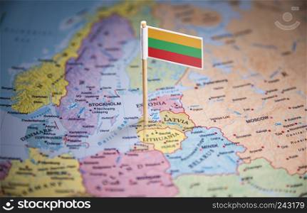Lithuania marked with a flag on the map.. Lithuania marked with a flag on the map