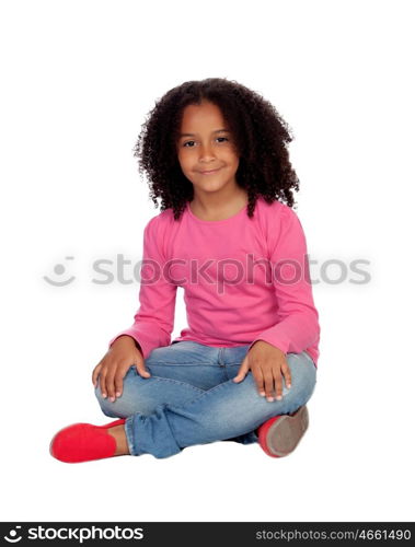 Little african girl sitting on the floor isolated on a white background