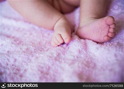little baby feet, close up on purple. little baby feet, close-up
