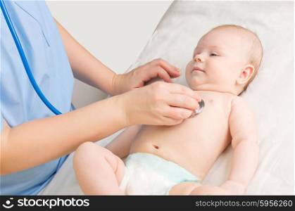 Little baby girl with doctor