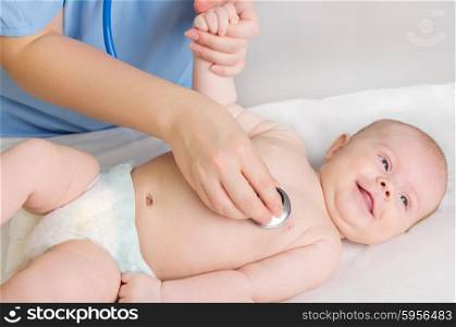 Little baby girl with doctor
