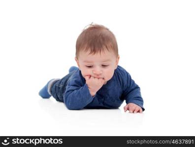 Little baby lying on the floor isolated on a white background