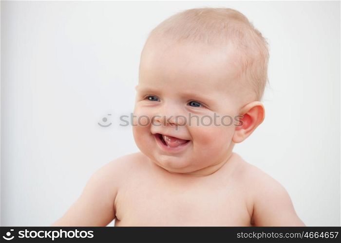Little baby six month with blue eyes and blond hair gesturing