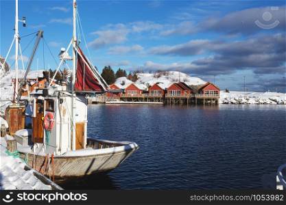 Little bay in winter on Lofoten islands. ships and rorbu. Norway