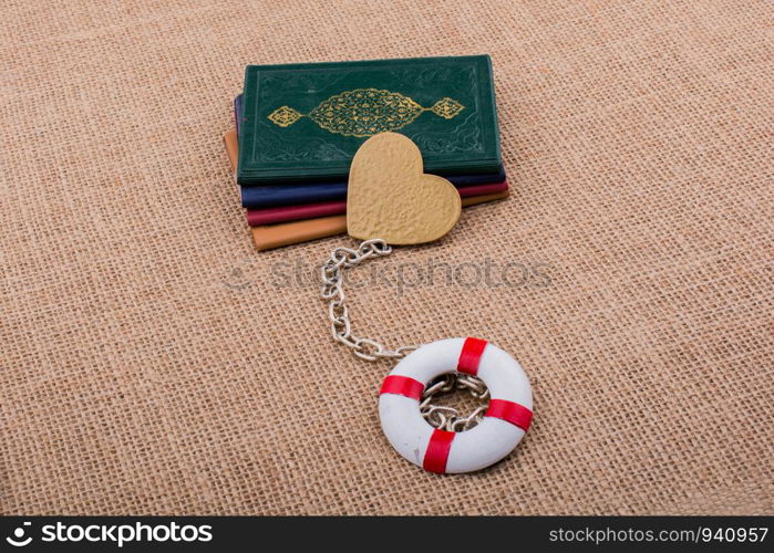 Little books attached to a life saver with a chain