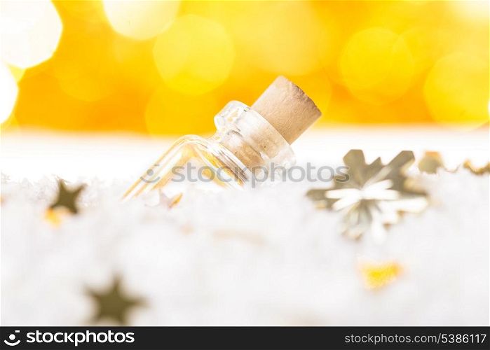 Little bottle on the snow - symbol of christmas wishes