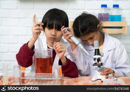 Little boy and girl in science classroom It is the basis for the process of systematic thinking, reasoning, observation, data collection. as well as analysis for processing