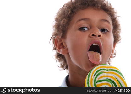 Little boy and lollipop