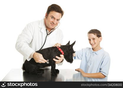 Little boy brings his dog to the vet for a checkup. Isolated on white.