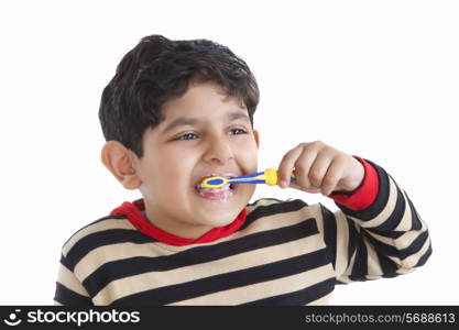 Little boy brushing his teeth