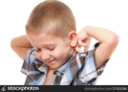 little boy buttoning on shirt, isolated on white background