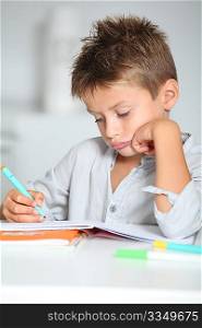 Little boy doing his homework