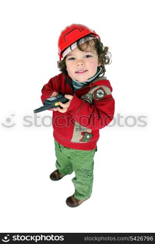 Little boy dressed as builder