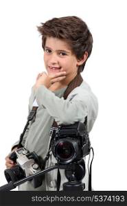 Little boy dressed as cameraman
