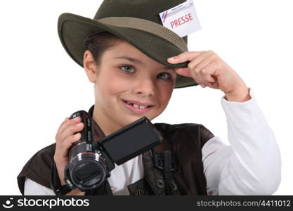 Little boy dressed as reporter