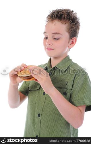 Little boy eating a hamburger. isolated on a white background