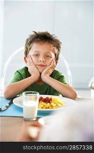 Little Boy Eating Dinner