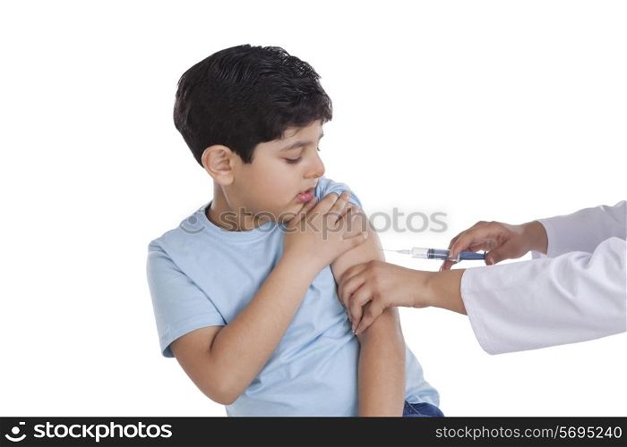 Little boy getting an injection