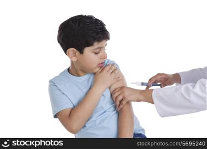 Little boy getting an injection