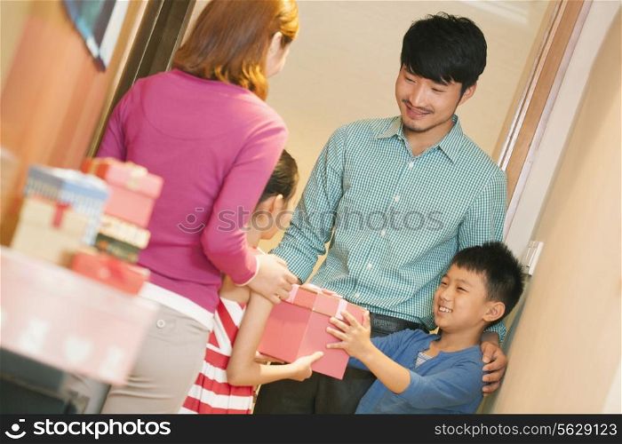 Little Boy Giving Little Girl a Gift