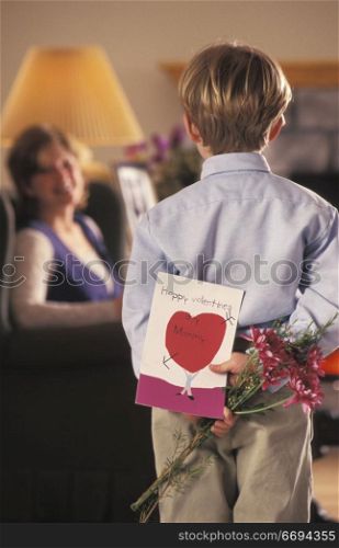 Little Boy Giving Valentine to Mom