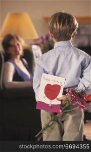 Little Boy Giving Valentine to Mom