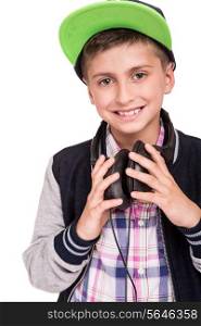 Little boy holding headphones over withe background