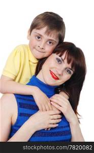 little boy hugs a young beautiful girl on the white background