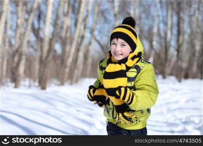 Little boy in a winter park