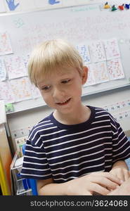 Little Boy in Classroom