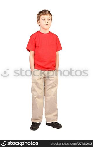 little boy in red shirt hands in pockets standing on white background
